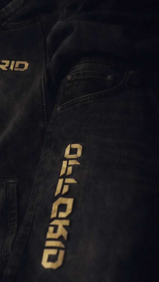 dark colored jeans with offgrid label